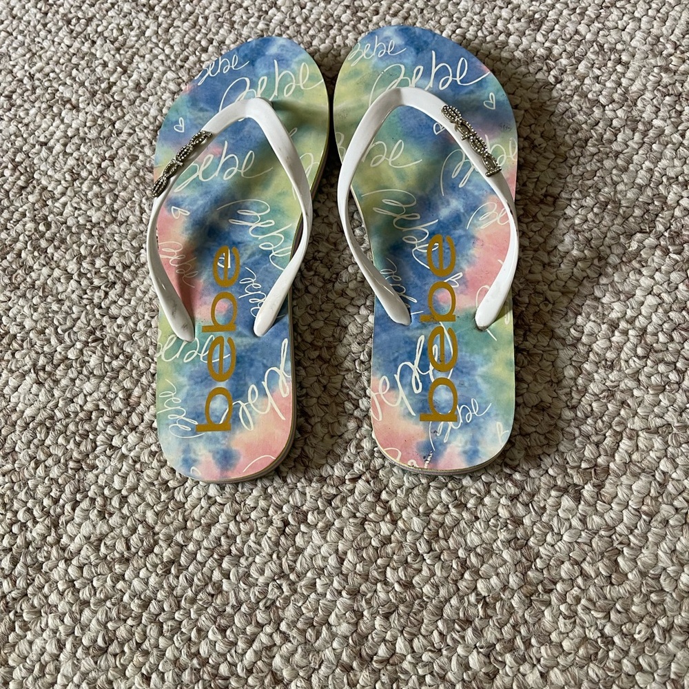 Brand new BEBE flip flops size 8